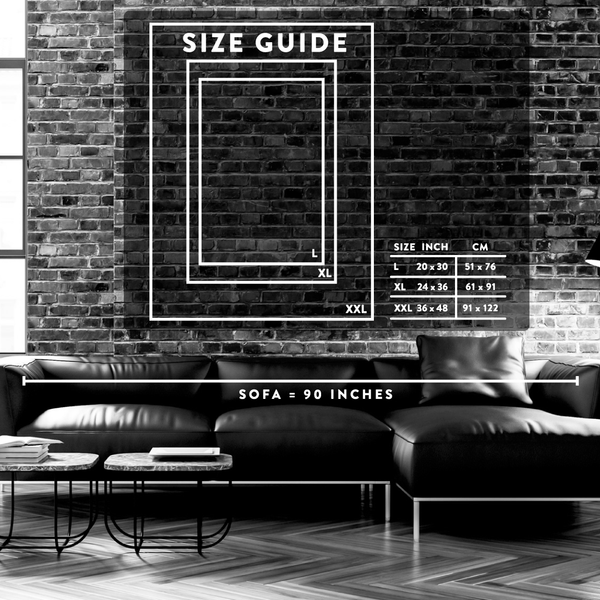 Living room with a black leather sofa and size guide on a brick wall